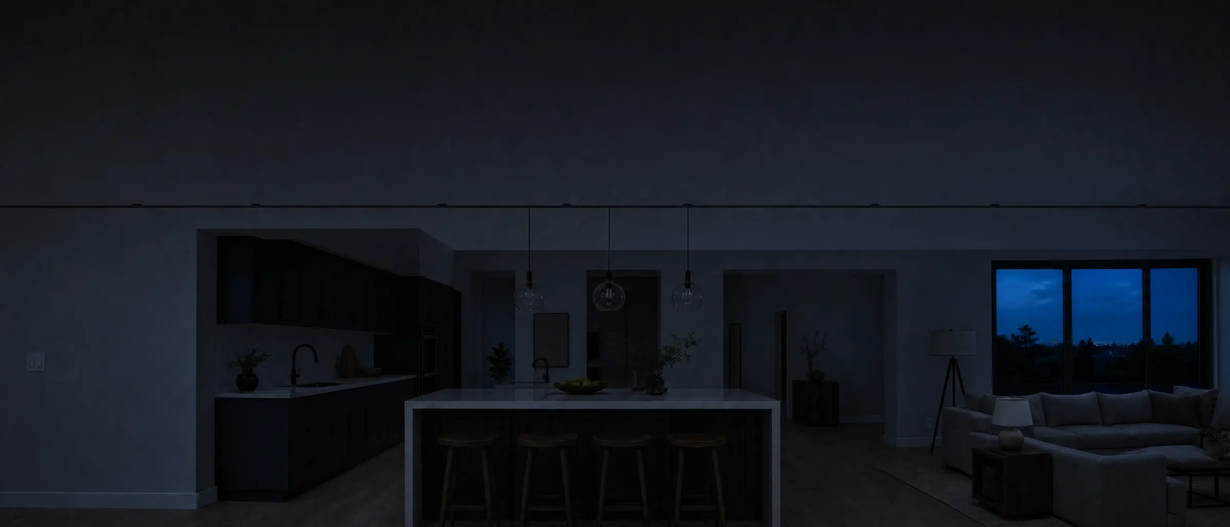 A room at dusk where the lights come on, one circuit after another